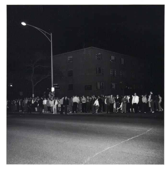 Students line Sheridan Road celebrating Loyola's National Basketball Championship on March 23, 1963.
