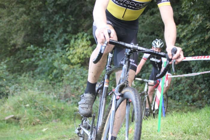 Modern cyclocross racing bikes feature cantilever brakes like those found on touring bikes, so there should be no need to change brakes.