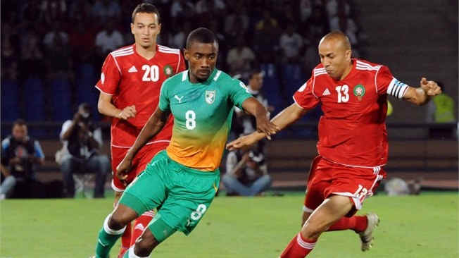 Ivory Coast's Salomon Kalou (8) in action as he fights for possession with Houssine Kharja (13) of Morocco during a World Cup qualifier in Marrakech, Morocco on June 9, 2012.