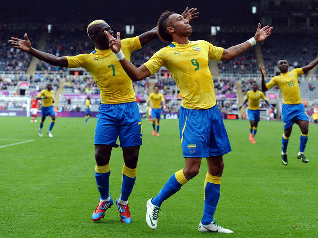 Pierre-Emerick Aubameyang (9) celebrates with Allen Nono (7) after scoring against Switzerland during the 2012 Olympic tournament. Aubameyang had earlier guided Gabon to a quarter-final berth at the 2012 AFCON.