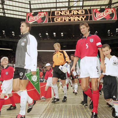 Oliver Bierhoff (gray jacket), Oliver Kahn (1) and Tony Adams (5) walking out onto the field on Oct. 7, 2000 in what was England's final match at the old Wembley Stadium. Germany won 1-0.