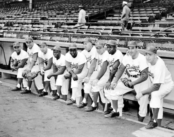 The real lords of Flatbush: Furillo, second from left. The 1956 Brooklyn Dodgers with manager Walter Alston. Five Hall of Famers and the rest should be. Alston remained manager until 1976.