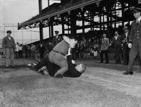 1940: The "Good Ol Days?" Frank Gernano pummels umpire George Magerkurth after a tough loss by the Dodgers.
