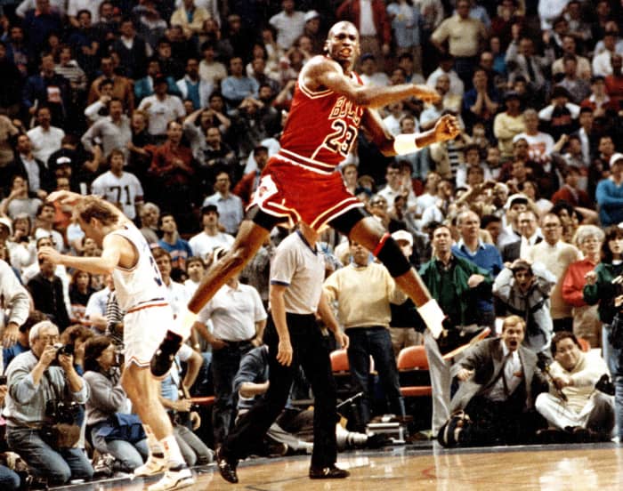 Michael Jordan celebrates after sinking the higher seeded Cleveland Cavaliers with a clutch mid-range shot.