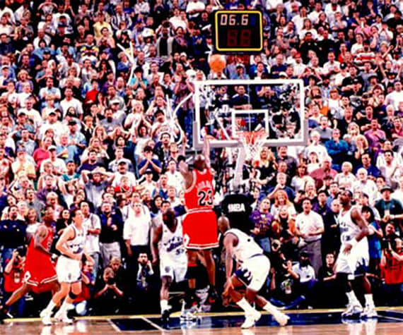 Michael Jordan has a fitting end to his career with the Chicago Bulls—winning the NBA Finals with a clutch jump shot.