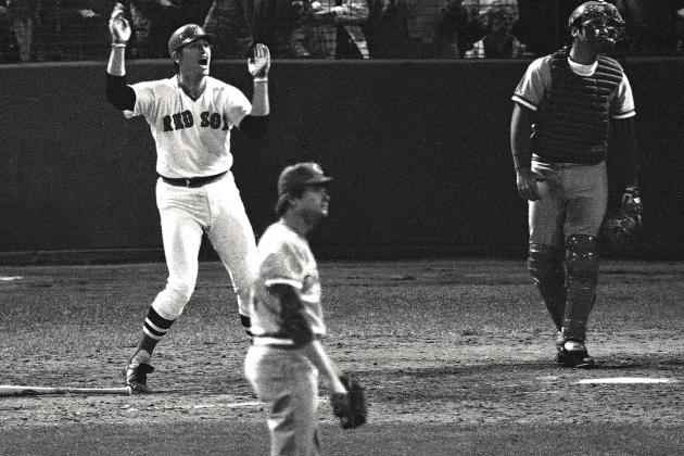 12th Inning, Game 6. Fisk urges his ball to the foul pole. Pitcher Pat Darcy looks on helplessly.