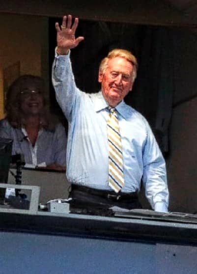 A kid excited because an announcer acknowledged him? You bet! He was that popular. "Dad! Vin Scully just waved at me!"