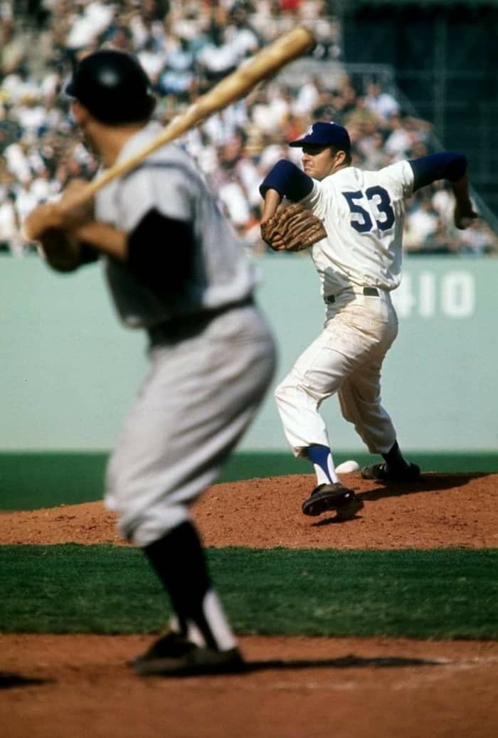 Drysdale delivers to pinch hitter Yogi Berra with his iconic wind up. It was Yogi's last World Series at bat.