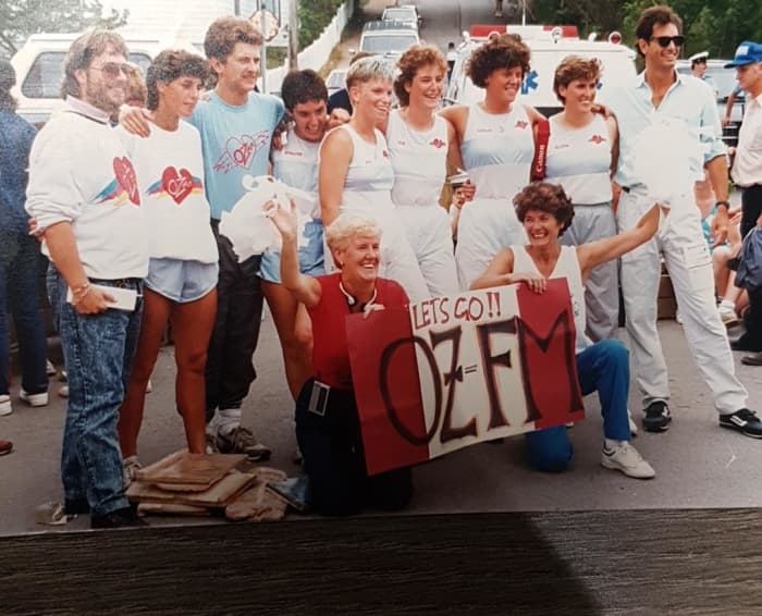 1987 OZFM Women's Crew (author's wife Kim is 6th from left) l to r: Bruce Morel, Leona Rockwood, Abby Whiteway, Bernadine Ring, Kim Fudge, Kim Power, Siobhan Duff, Allison Carroll, Scott Sterling. With banner: Patricia Power, Shannie Duff.