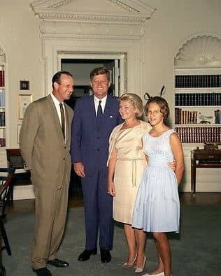 Stan Musial visits the President John F. Kennedy at the White House. Stan's wife Lil is next to President Kennedy.