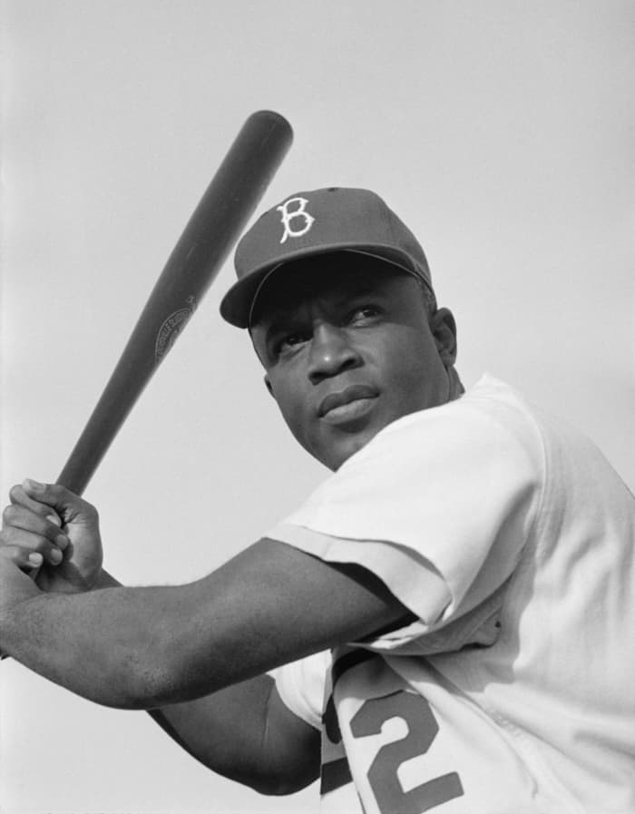 Jackie Robinson, as seen in 1954, broke Major League Baseball's color barrier in 1947 when he debuted for the Brooklyn Dodgers, and is the most influential baseball player of all-time.