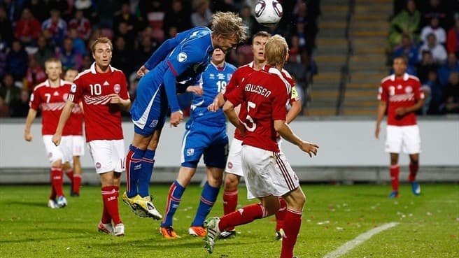 Iceland's Birkir Bjarnason heads in a goal during Iceland's 2011 UEFA U-21 Championship match against Denmark in Aalborg. Birkir became Iceland's first goalscorer at a major tournament when he scored against Portugal at Euro 2016.