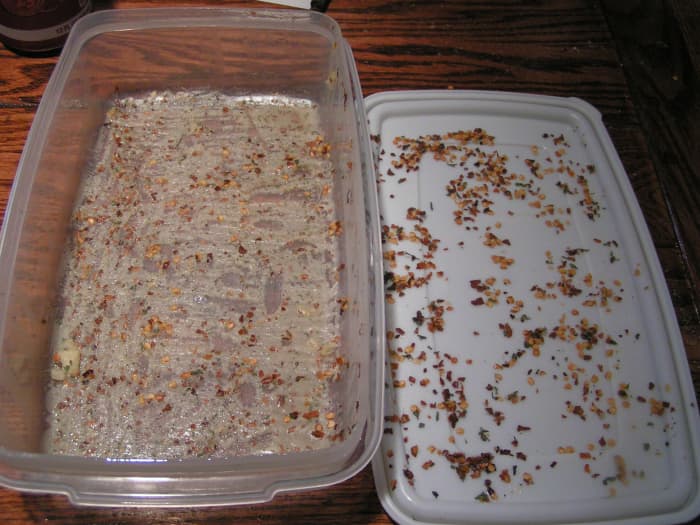 This picture shows the oil and spices that remain after moving the crackers from the containers. This is normal. Your crackers will still have lots of flavor.