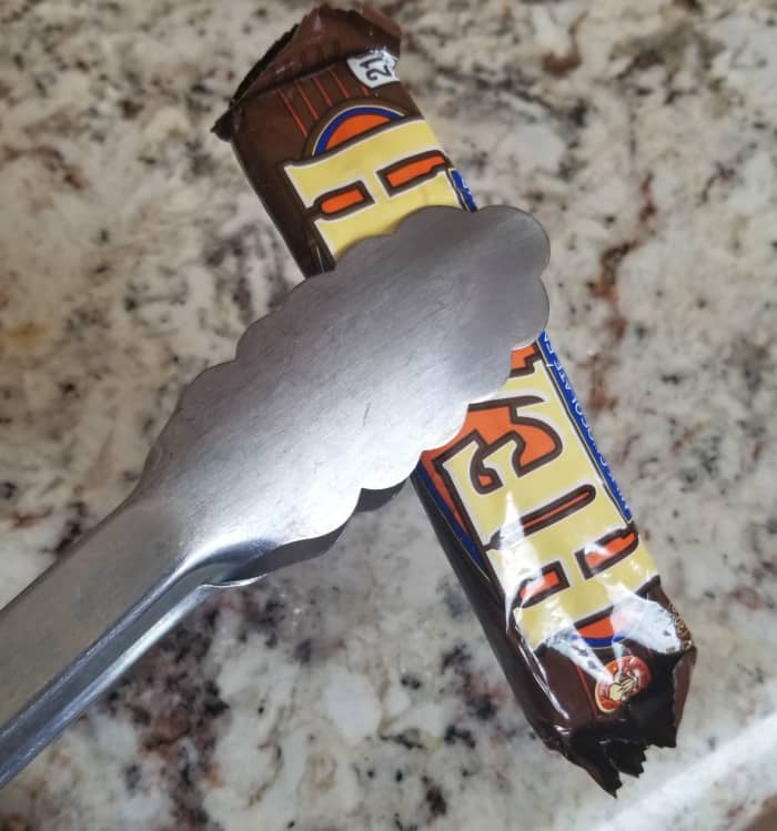 Give your child tongs so they do not have to stick their hands in candy bowls that half the neighbors have touched.