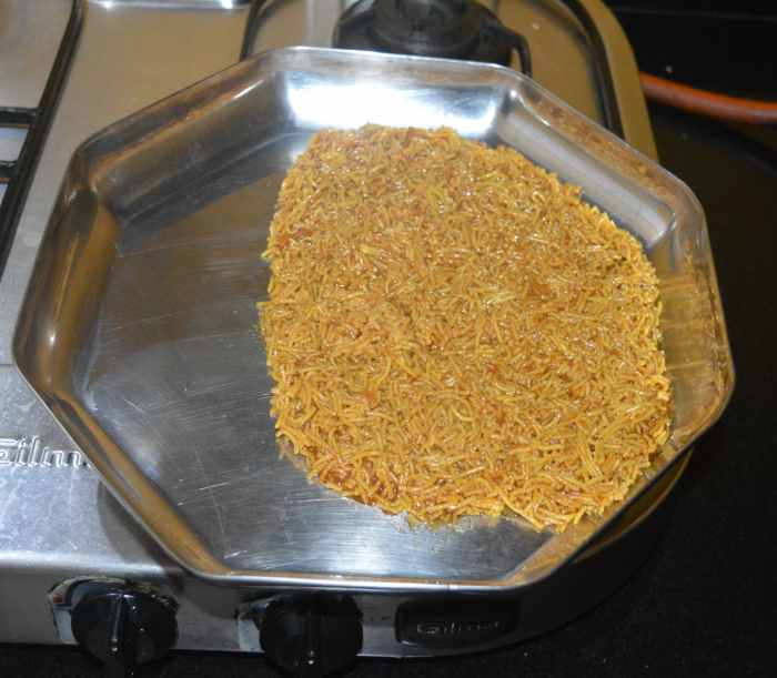 Spread it evenly with the help of a spatula.