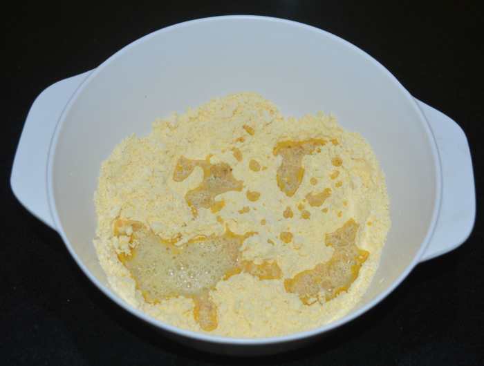 Add very hot oil. After a few seconds, mix it with your fingers.