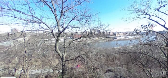 A winter view of the Harlem River behind Highbridge Pool where Peebles says he threw the gun. In July 1950, vegetation would have nearly obscured the river making an accurate toss impossible.