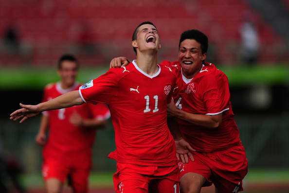 Granit Xhaka (11) celebrates with teammates after scoring the go ahead goal against Japan in a FIFA U-17 World Cup match against Japan.