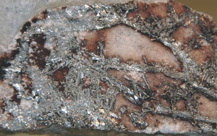 The Cripple Creek Gold District of central Colorado, USA is famous for its unusual gold and silver mineralization. Precious metal mineralization occurs in the Cripple Creek Diatreme, the root zone of a deeply eroded volcano dating to Early Oligocene
