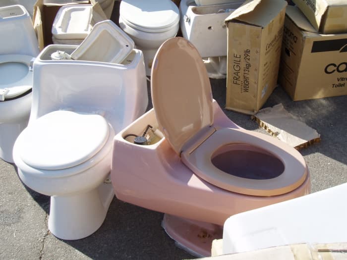 Let's say you insert this photo next to a paragraph describing how to dispose of old toilets. Then you decide to add another section above it. When the new section moves the existing text down, you'll want this photo to move down too.