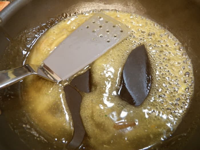Pour mixture into a pan and stir until it boils and becomes thick.