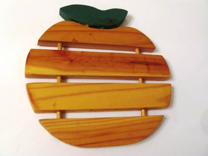 My dad made this trivet from wooden stakes taken from signs directing guests to my wedding. We still enjoy it 20 years later.