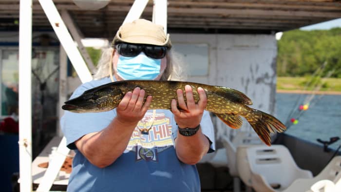 My husband caught dinner! (Yes, wearing a mask, because we were fishing with strangers during the pandemic.)