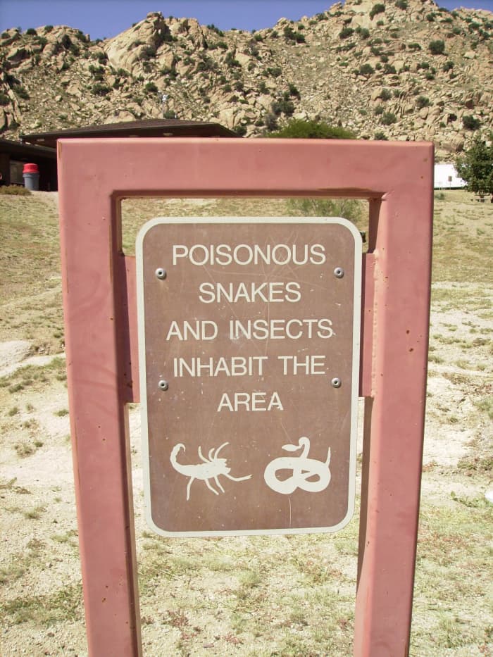 Sign warning about presence of poisonous snakes in the Arizona desert.