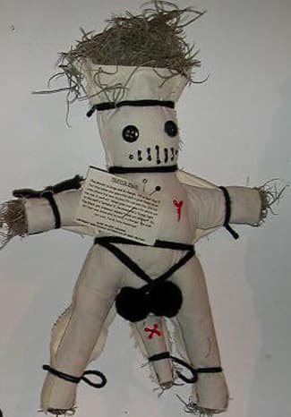 When your man sees the white pin in the doll's "private's", he knows he's flying right. The black pin, however, means "Look out Mister!" So, let that man know who's really in charge!