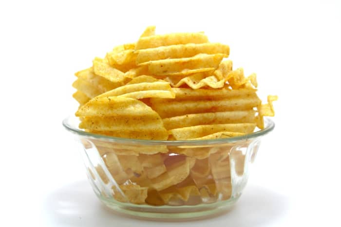 Potato chips are thin and very crispy, but they are usually deep fried, rather than baked in an oven.
