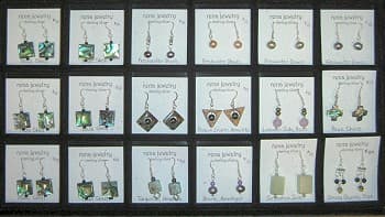 An easy way to show jewelry to a shop or gallery owner - in a stacking jewelry tray with a compartmentalized tray liner.