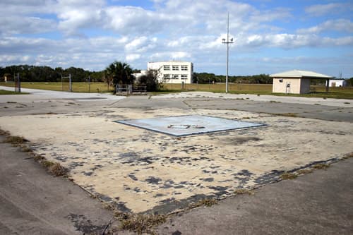 Discarded Dreams of Camelot: Cape Canaveral, Pad B - Represents the loss of key people and an important Era, including the US Space Program, which was John F. Kennedy's dream.