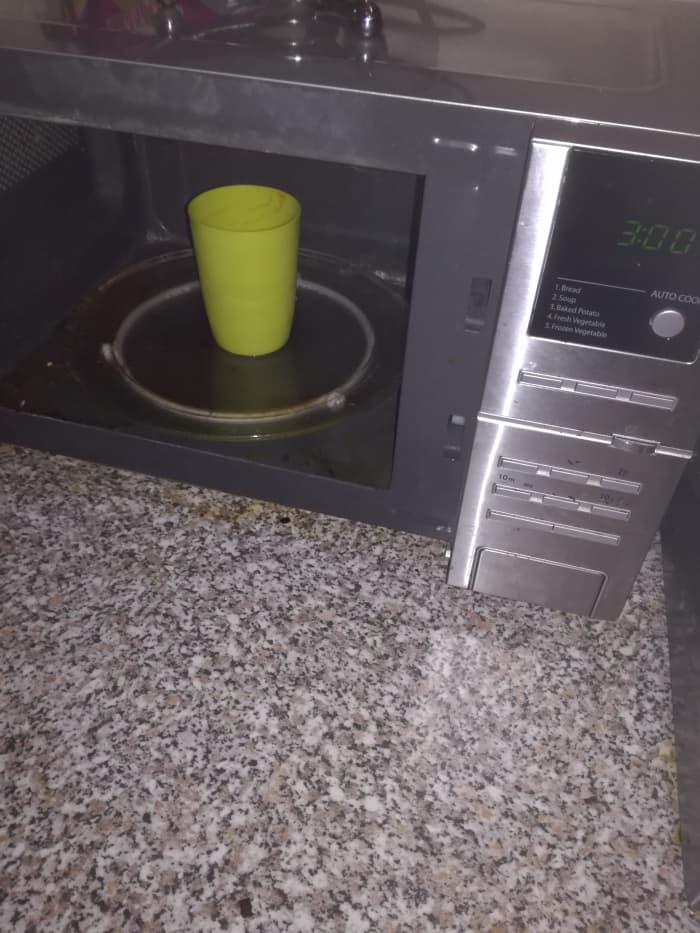 Vinegar, lemon juice and water microwave for 3 minutes and voila a stain free microwave friendly cup.