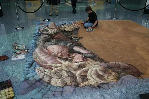 The mural is 15x15 feet. The image is lightly sketched on the surface, but most of the work will be done on site in front of the public.