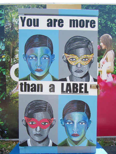 This poster compares the reader to a label and finds the label lacking. A person is so much more than a label!