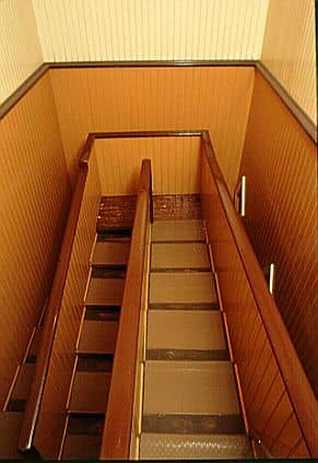 The 44 steps that make up this stairwell should extend for three stories; instead, because each step is only 2" high, the staircase only rises 9 feet