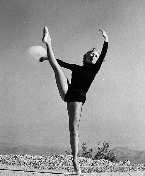 Performance artist with mushroom cloud; 1953 during Cold War nuclear testing. Is clip art or photos useful on a resume?