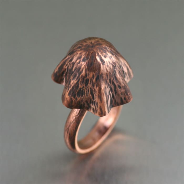 Richly enchanting, this handmade copper mushroom ring showcases a large, Liberty Cap mushroom that is guaranteed to make some magic.