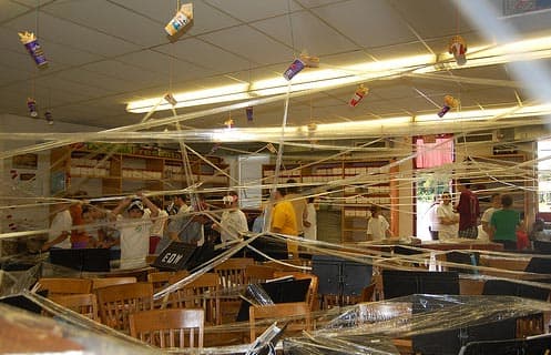 Pick popular teachers and fill their room, so when they come in the next day, they'll be in for a surprise. Try filling a room with saran wrap.