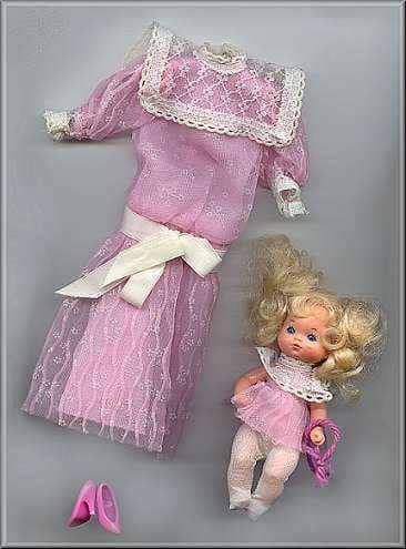 Mr. Heart was so overwhelmed by Barbie's generosity, he gave her his ex-wife's dress that was thrown to the curb with the baby.