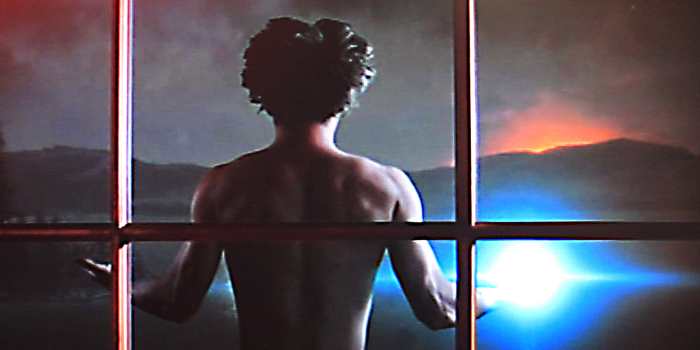 There is a God-like symbolism in much of 'Starman'. In this still from the film, the Starman has just emerged on Earth in his new human form and magically creates light and power