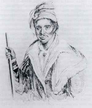 Abraham, a Black Seminole Leader in the Second Seminole War (1835-1842). The Indians called him "Souanaffe Tustenukke," a title indicating membership in the highest of the three ranks of war leaders. He is wearing typical Seminole dress and holding a