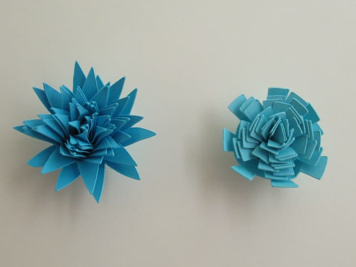 Once you have the flowers glued and they have dried, you can work the petals to create a more lifelike flower