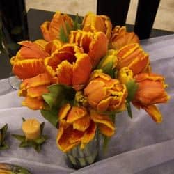 This tulip bridal bouquet can be set in a vase to decorate the head table during the reception.