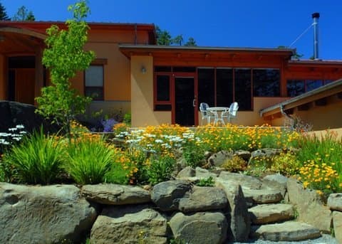 A Master's Masterpiece - my favorite sunken garden, tucked between a natural rock wall and the house.