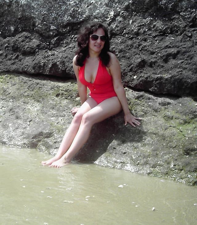 One-piece swimsuit features in plunging deep V neckline, Adjustable halter straps extend to the back of the neck. Backless. Good quality strong material offers support and acts as a girdle