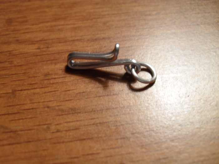 This jump ring will attach to one end of the chain and the the other end will be attached to a single eye.