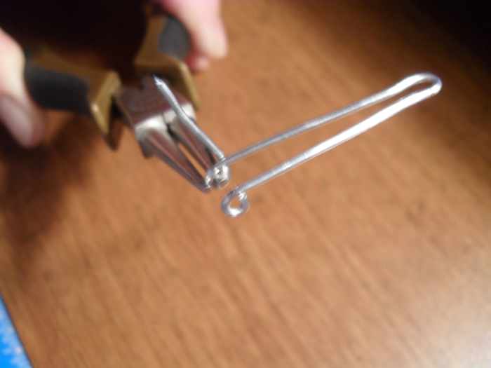 Push the existing eye loop on to the chain nose to help line up the tag end before making the second eye. This will help make both eyes the same size and keep them in line with each other.