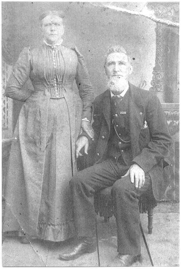 Is the man setting down in this photo the infamous Jack the Ripper. If so his real name is James Kelly. This photo was in with papers I purchased in 1991 at a London Street Market. There was a note identifying the man as James Kelly and Wife.