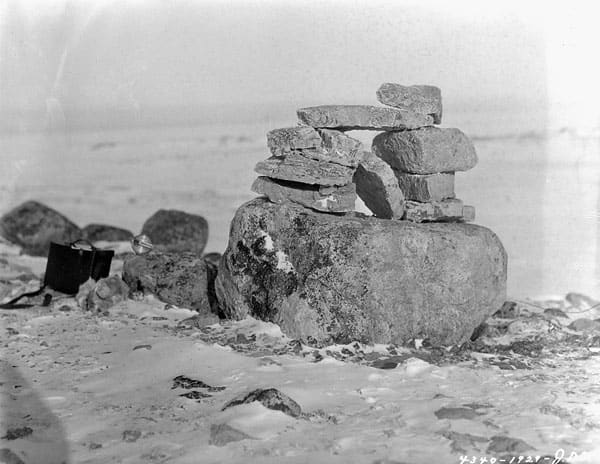 Inukshuk on a plateau at the northern extremity of Baffin Island in Nunavut, Canada. Public domain: March 31,1929.